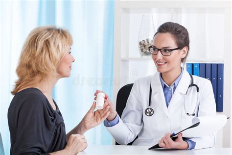 Doctor Giving Medicines To Patient Stock Photo Image Of Hospital