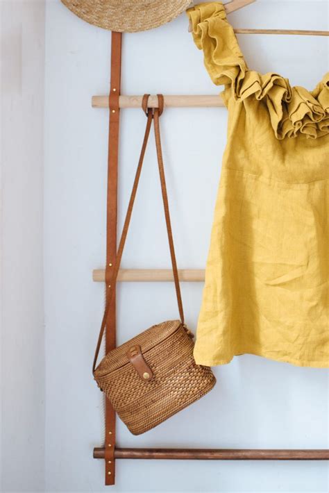 See more ideas about home decor, home diy, home. Your closet needs this DIY Leather Clothes Ladder ...