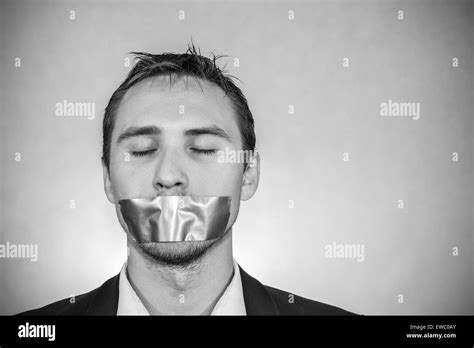 Photo Of A Young Man With Sellotape Covering His Mouth Stock Photo Alamy