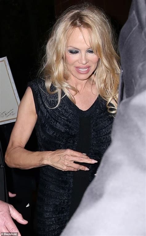 Pamela Anderson 55 Puts On A Leggy Display In A Black Mini Dress