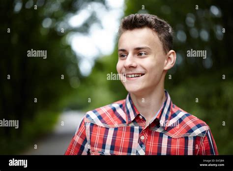 Closeup Of A Handsome Teenage Boy Outdoor In A Park Stock Photo Alamy