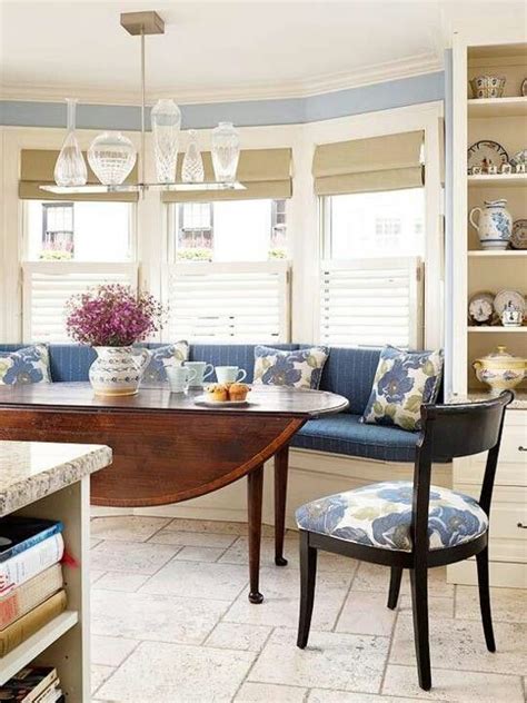 These windows are big and accommodate big space in your kitchen. Bay window seating with small breakfast table. love the ...