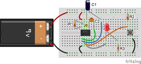 Here's our schematic in its current shape. 555 Timer Basics - Monostable Mode