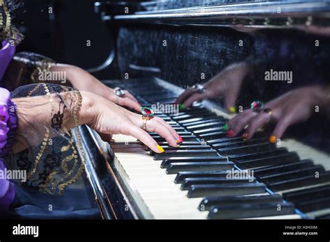 Woman Playing The Piano Stock Photo Alamy