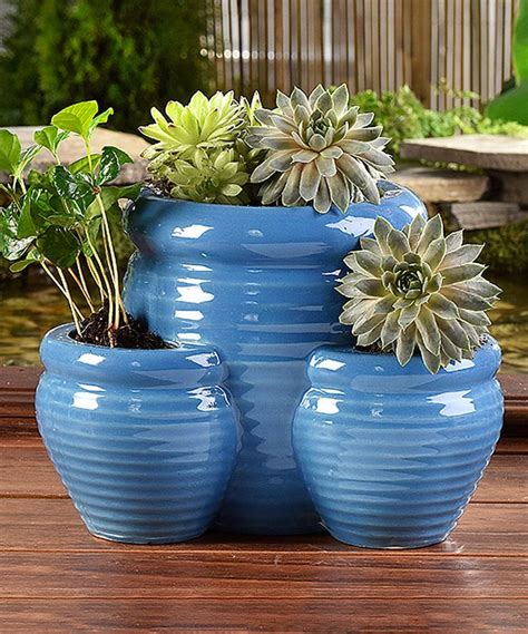 It should be large, but not too choose if you want a prettier terra cotta container or if you want a lightweight plastic pot that will retain water better. Take a look at this Blue Strawberry Planter Pot today ...