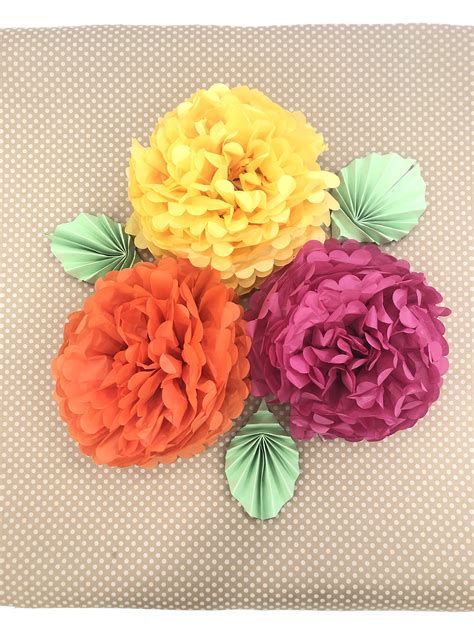 Centerpiece With Tissue Paper Flower And Construction Paper Leaves