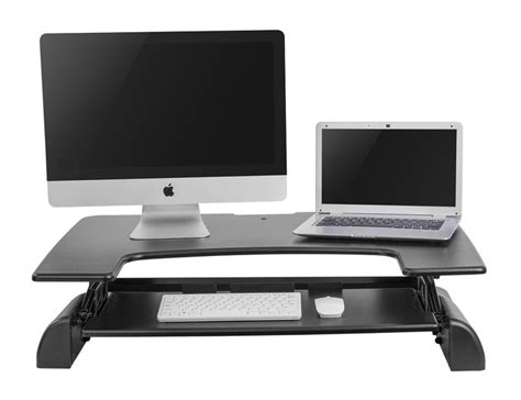 You come to work and it takes you up like 3 stories. Updesk - Sit-stand desk elevator, create a standing station