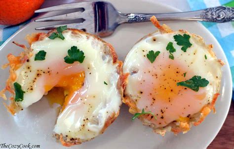 One at a time, break eggs into a saucer and slip them into the indentations. Hash Brown Cups & Eggs - The Cozy Cook
