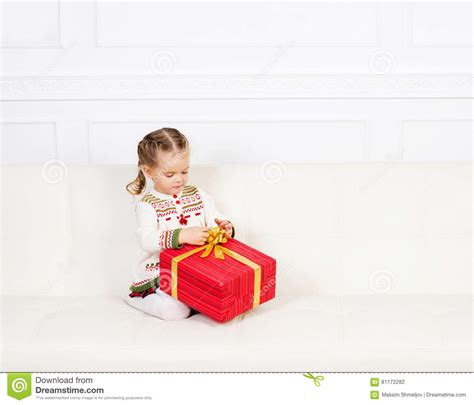 Little Girl With A Christmas T Stock Photo Image Of Celebration