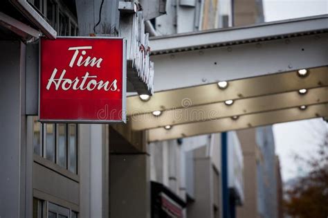 Tim Hortons Logo In Front Of One Of Their Restaurants In Montreal
