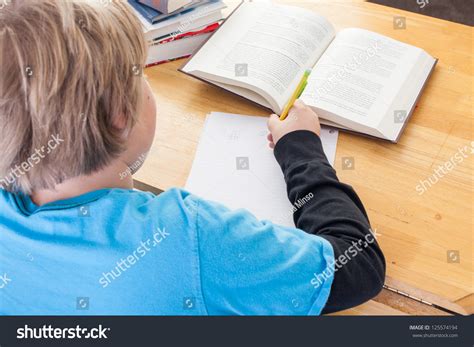 Over Shoulder View Young Boy Doing Stock Photo 125574194 Shutterstock