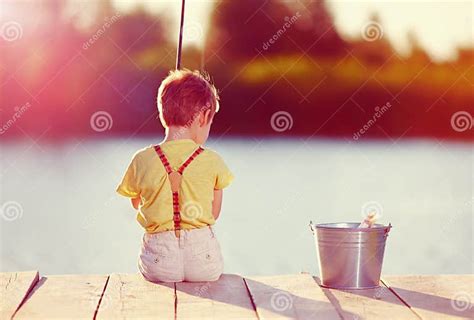 Cute Little Boy Fishing On Pond At Sunset Stock Image Image Of Retro