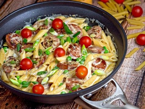 In a large saucepan, saute onion and garlic in oil until tender. Cajun Smoked Sausage Alfredo - The Midnight Baker ...