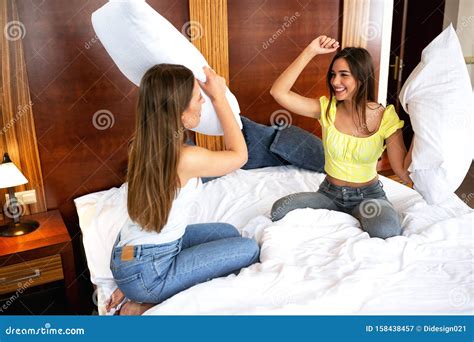 Pillow Fight Between Two Girls Stock Image Image Of Apartment Interior
