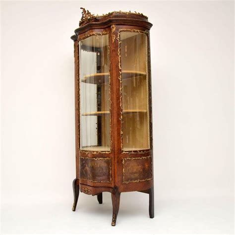 Country french carved oak vitrine display cabinet linenfold panels, ca. Antique French Ormolu Mounted Painted Vitrine Display ...
