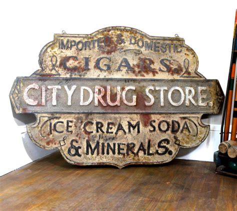vintage style stamped tin drug store trade sign the kings bay