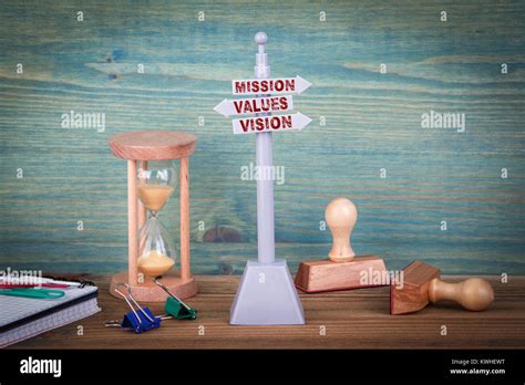 Mission Values Vision Signpost On Wooden Table Stock Photo Alamy