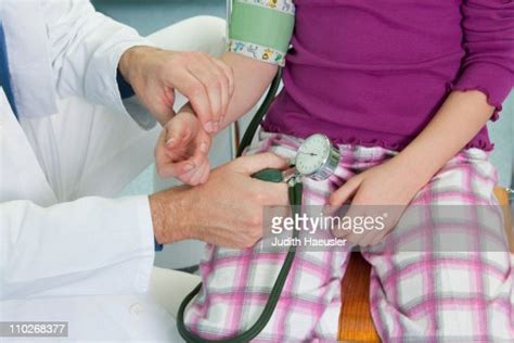 Doctor Testing Childs Blood Pressure High Res Stock Photo Getty Images