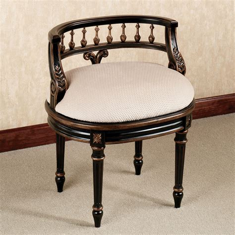 Bathroom vanity chairs are very popular among interior decor enthusiasts as they allow for an added aesthetic appeal to the overall vibe of a property. Queensley Upholstered Black Walnut Vanity Chair