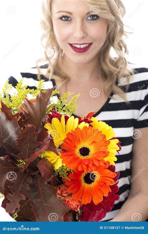 Young Woman Holding A Bunch Of Flowers Stock Image Image Of Close