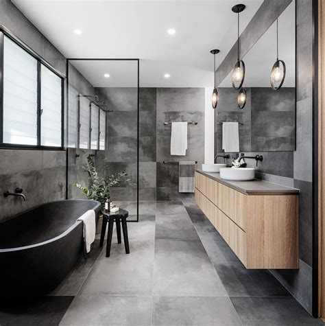 The 48 coolest bathroom tile ideas and designs you need to try. A Cloudy Grey Tile Sets The Palette For This Bathroom in ...