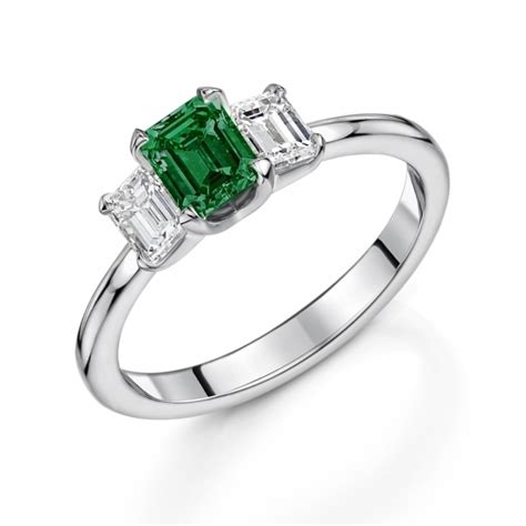 Platinum Three Stone Emerald Cut Emerald And Diamond Ring