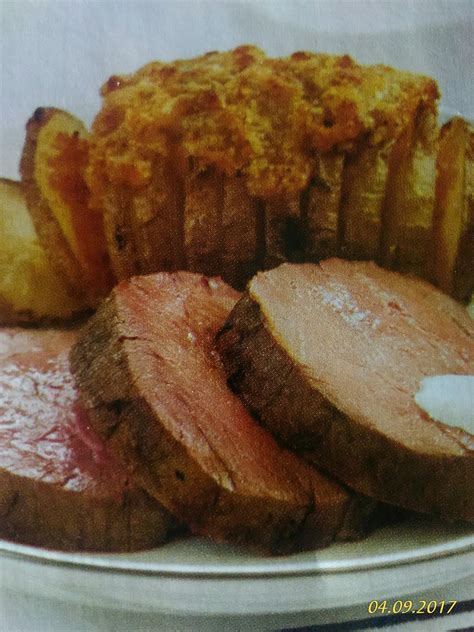 Toss potatoes with 1 tablespoon oil and rosemary on a rimmed baking sheet; Classic Beef Tenderloin with Crispy Baked Potato Fans ...