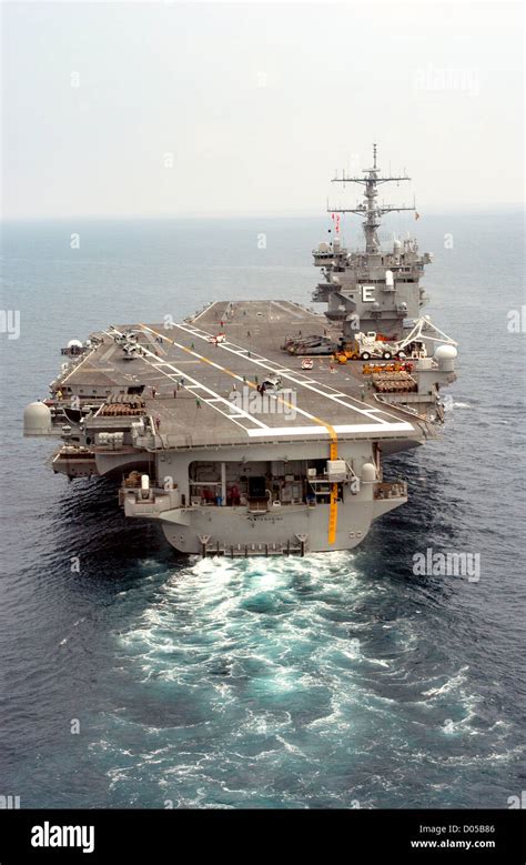 The Nuclear Powered Aircraft Carrier Uss Enterprise Steams Along In The