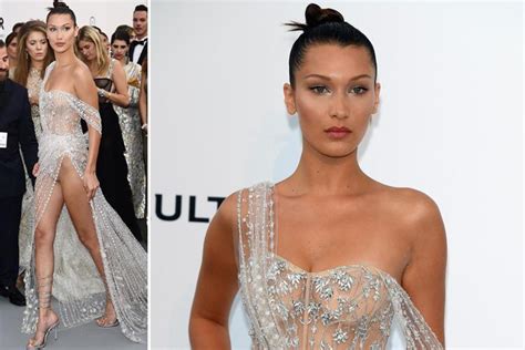 bella hadid flashes her knickers in sheer thigh split dress as she steals the show at amfar gala