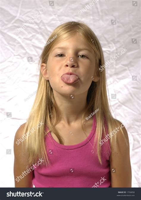 Young Girl Sticking Her Tongue Out Stockfoto Jetzt Bearbeiten 1756858