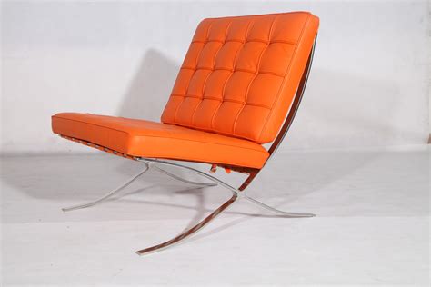 This barcelona chair replica has an angled seat that provides supreme relaxation. Orange leather Barcelona chair and ottoman Replica for ...