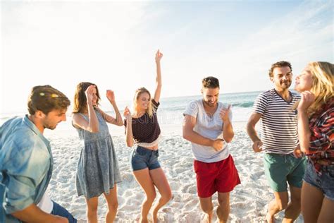 Friends Dancing On The Beach Stock Photo Image Of Smiling Group