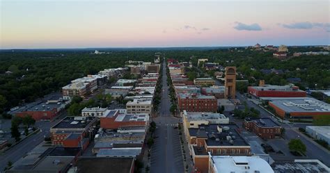 Drone Flight Over Downtown Of Small Town Stock Footage Ad Downtown