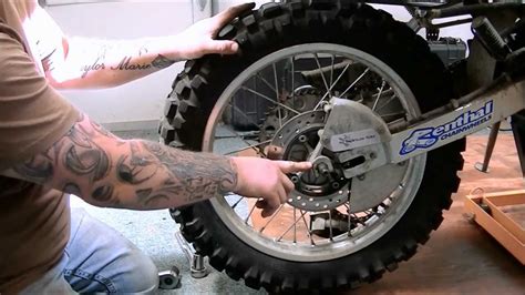 Removing the front wheel of a motorcycle may seem like a difficult task, but it doesn't have to be. How to remove the rear tire from a XR650L - YouTube