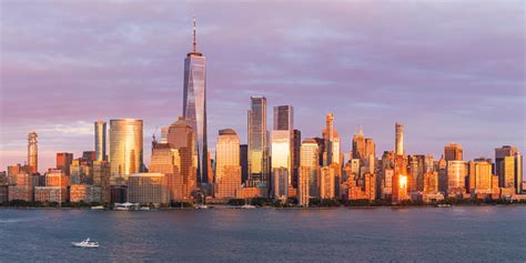 View To Manhattan Skyline From Jersey City At Sunset Stock Photo
