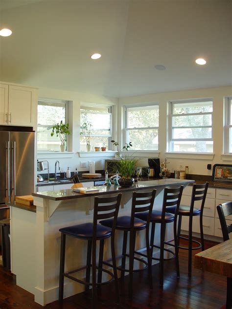 A multipurpose surface, they allow prep work, cooking, eating, working, and entertaining. 10 Great bar in kitchen Ideas