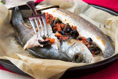Mediterranean Sea Bass Recipe Stuffed With Tomatoes Lemons And Olives My Greek Dish