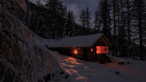 Snowy Cabin In The Winter Forest At Night Wallpaper Backiee
