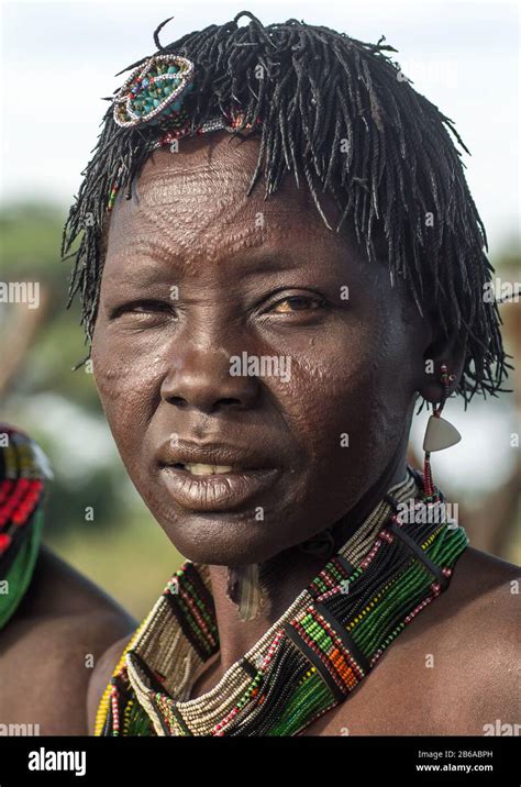 Toposa Tribe Woman With Scarifications On The Face And The Forehead