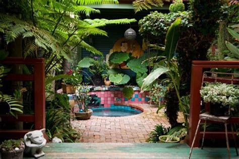 An alternative approach to cooling and ventilation in hot climate greenhouses. Back deck and hot tub ideas - Tropical - Patio - Los Angeles