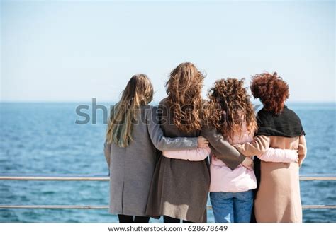 Back View Four Friends Hugging Near Stock Photo Edit Now