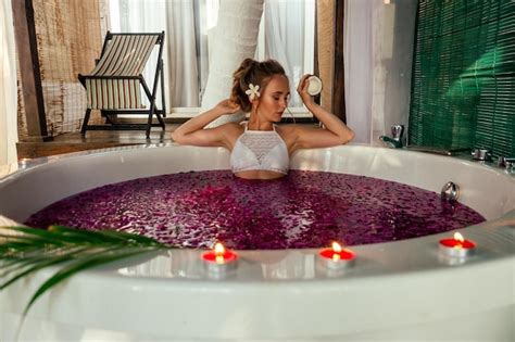 premium photo spa care st valentine s day female model romantic date in jacuzzi with flowers