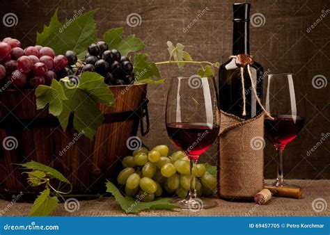 Still Life With Wine Bottles Glasses And Grapes Stock Image Image Of
