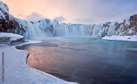 Godafoss Frozen Waterfall During Winter At Sunrise North Iceland Stock