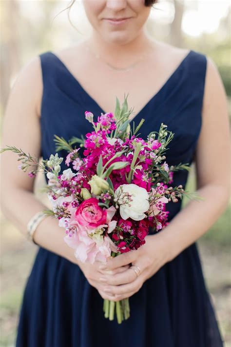 These pink wedding ideas prove that this color only gets better with time — and that we shouldn't expect to see it going away anytime soon. Bright pink flowers stand out against this navy blue ...
