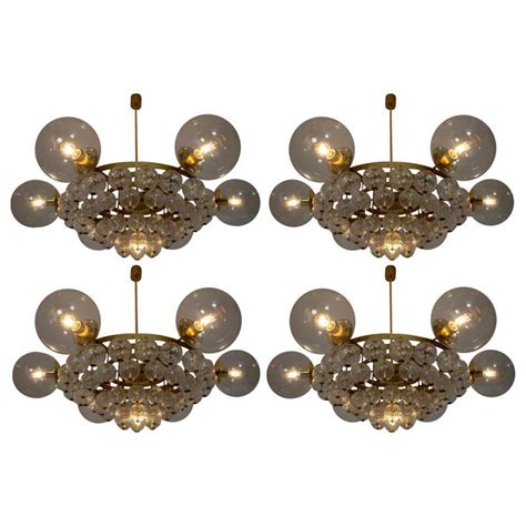 Set Of 4 Large Hotel Chandeliers With Brass Fixture And Structured
