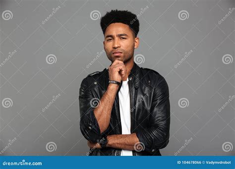 Portrait Of A Pensive Afro American Man In Leather Jacket Stock Photo