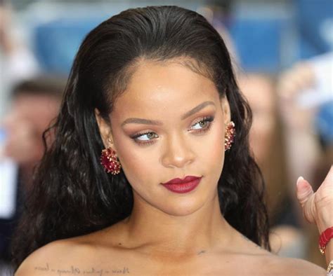 Rihanna Debuts A Sleek New Sideburns Haircut And Its A Vibe Elle