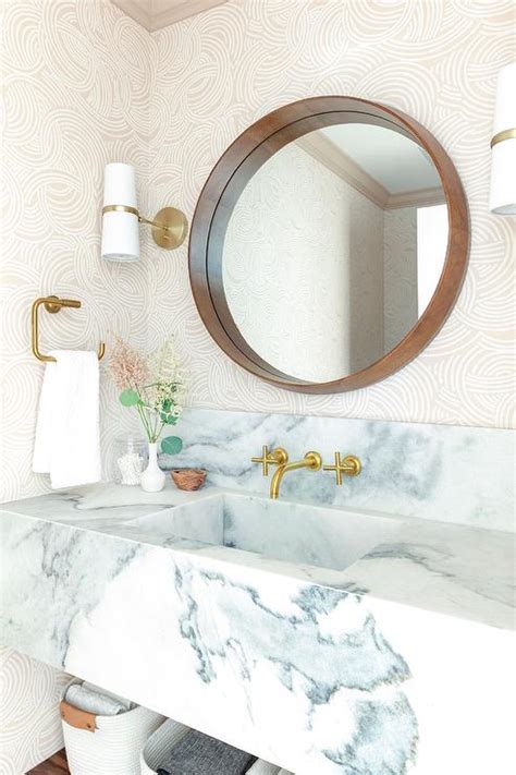 Fill baskets with towels or extra rolls of toilet paper and put them on the shelf—or stash extra toiletries and bath necessities in a drawer. Floating Vanity Design Ideas