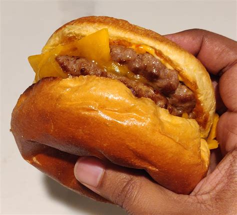 Homemade Double Cheeseburger On A Brioche Bun Food